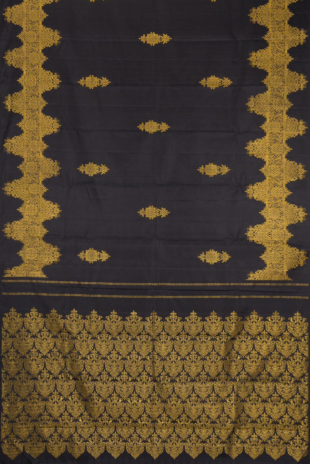 Flat view of Black Kanjivaram Silk Saree with Zari Butta on the body and Fancy Border. 