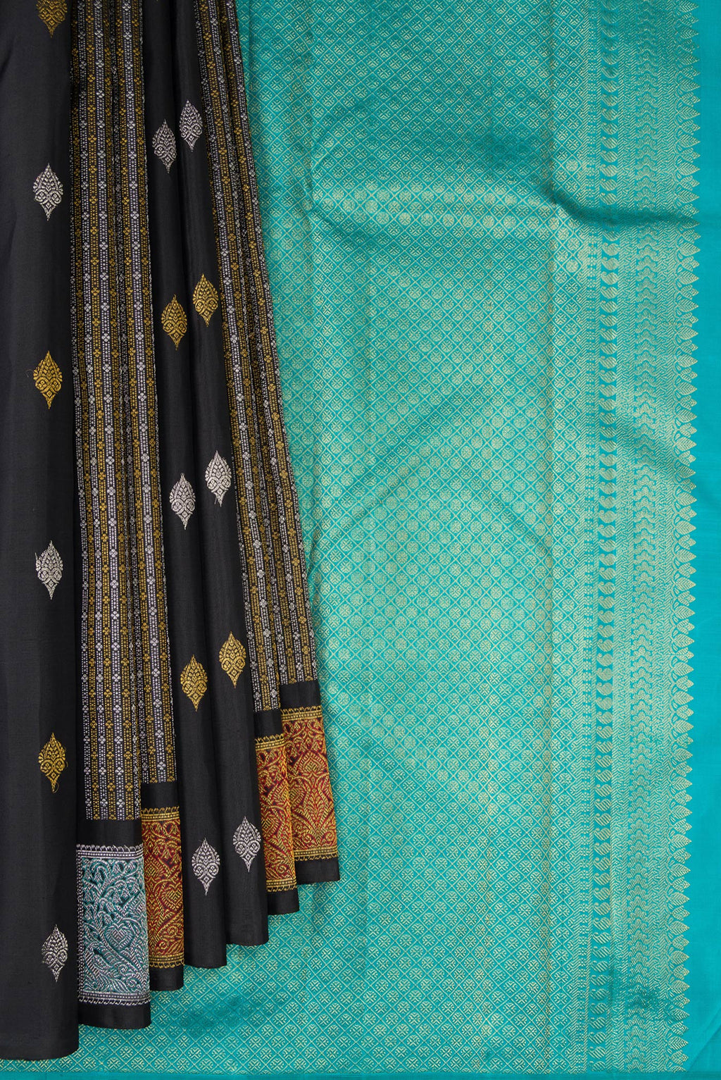 Pleats and pallu of Black Kanjivaram Silk Saree with Zari Butta on the body and Without Border. 