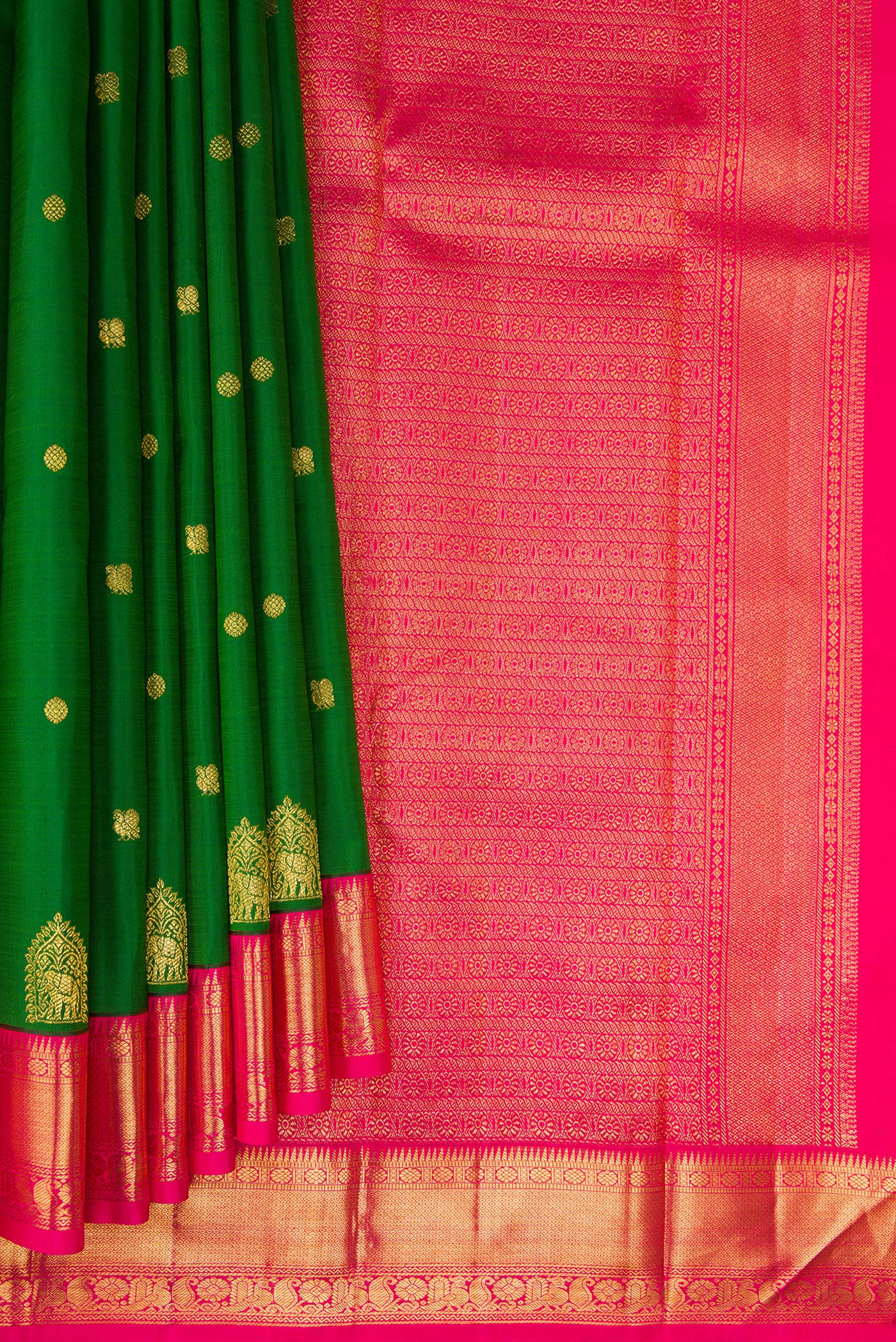 Pleats and pallu of Green Kanjivaram Silk Saree with Zari Butta on the body and Zari Border. 