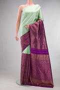 Pure Silk Multi Color Kanjivaram Saree with Half And Half on the body and Without Border.  displayed on a mannequin