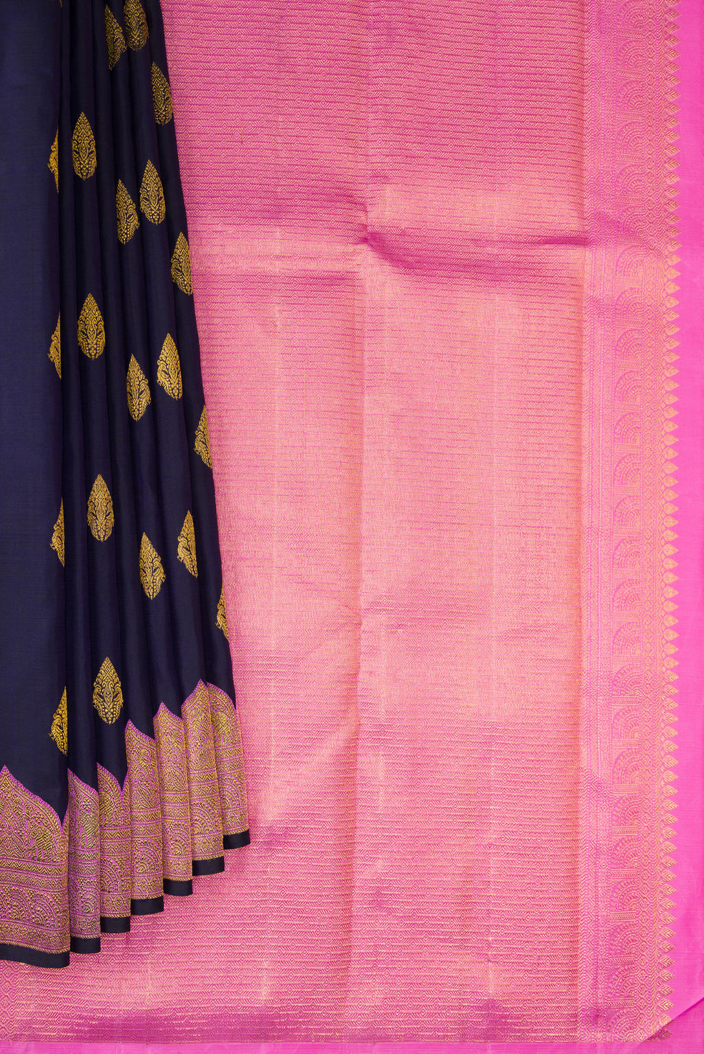 Pleats and pallu of Navy Blue Kanjivaram Silk Saree with Zari Butta on the body and Fancy Border. 