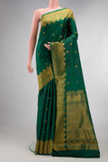Pure Silk Bottle Green Dual Tone Kanjivaram Saree with Zari Butta on the body and Fancy Border.  displayed on a mannequin