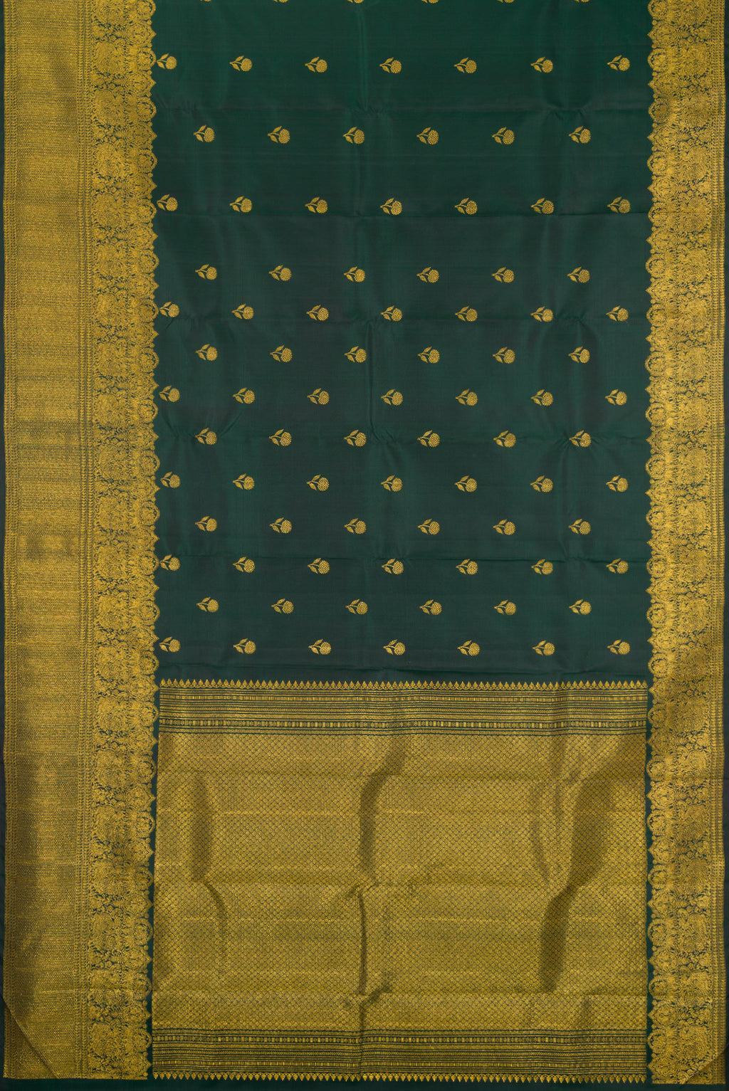 Flat view of Bottle Green Kanjivaram Silk Saree with Zari Butta on the body and Fancy Border. 