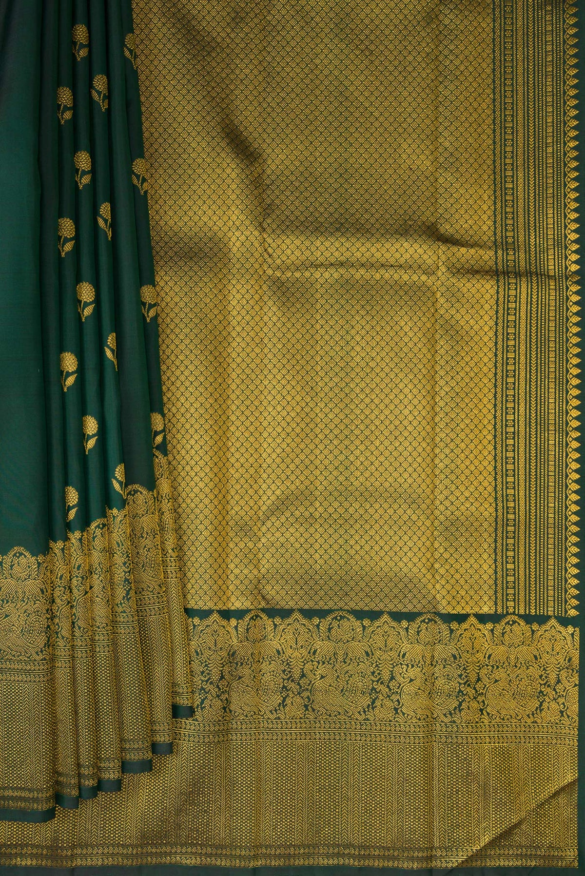 Pleats and pallu of Bottle Green Kanjivaram Silk Saree with Zari Butta on the body and Fancy Border. 
