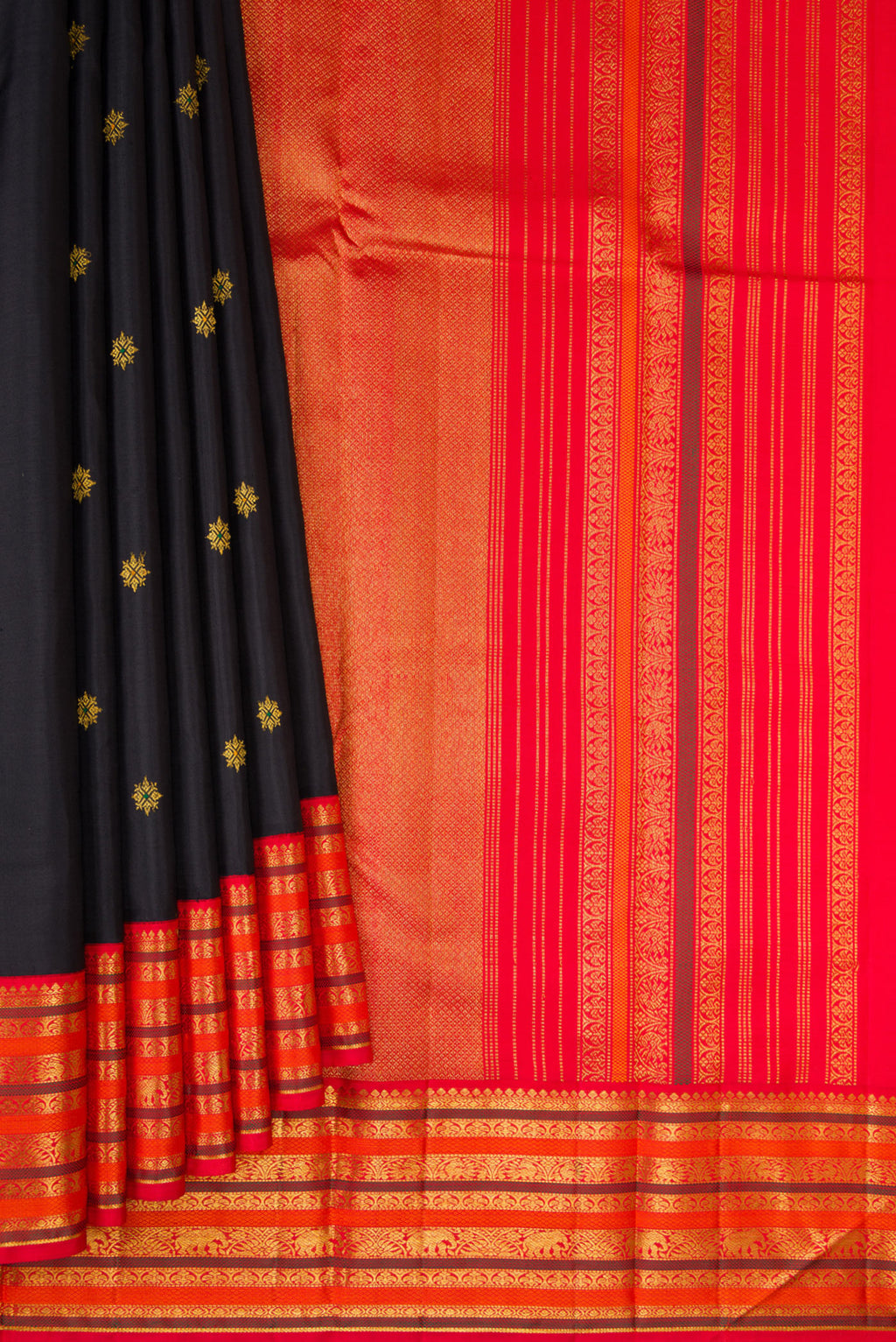 Pleats and pallu of Black Kanjivaram Silk Saree with Zari Butta on the body and Zari Border. 