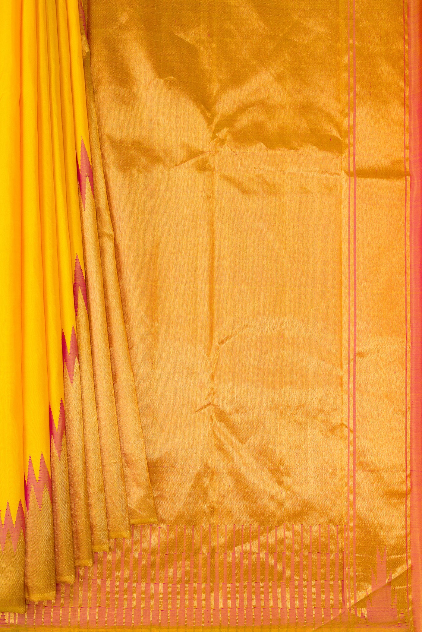 Pleats and pallu of Yellow Kanjivaram Silk Saree with Plain Body and Rising Temple Border. 