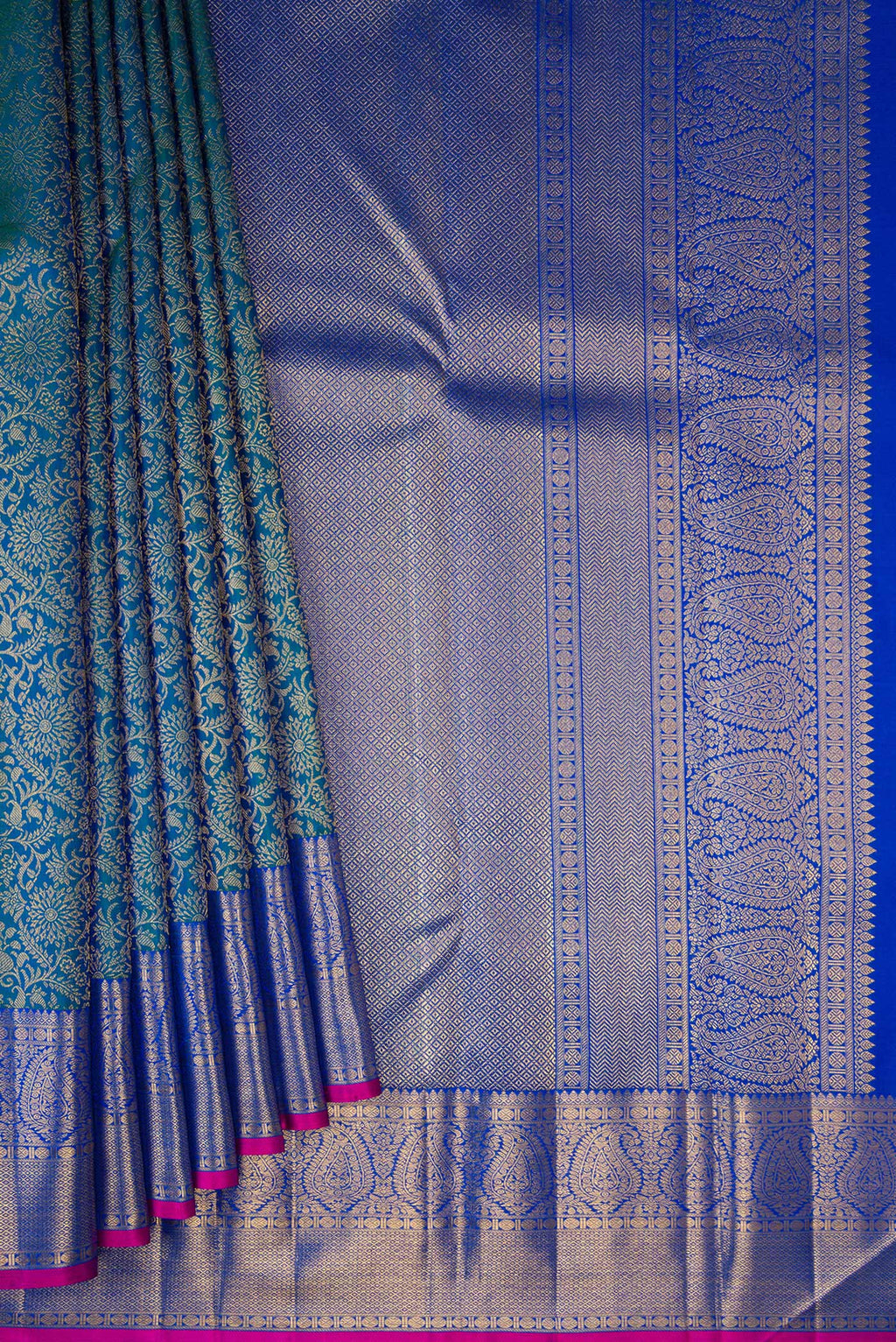 Pleats and pallu of Pure Silk Peacock Blue Kanchipuram Saree with Zari Brocade on the body and Zari Border. 
