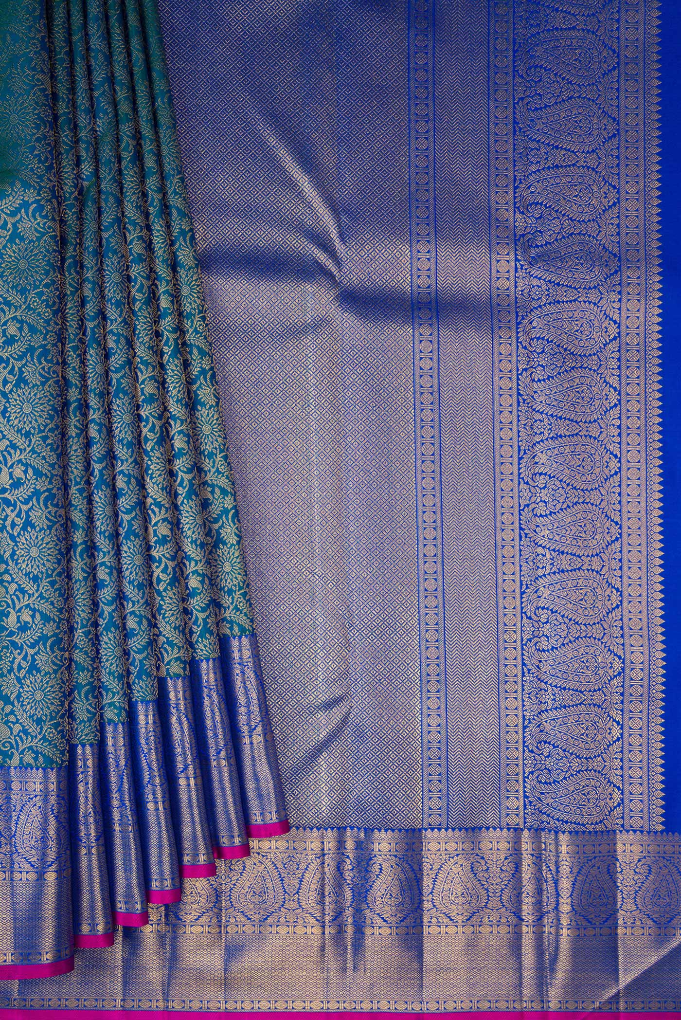 Pleats and pallu of Pure Silk Peacock Blue Kanchipuram Saree with Zari Brocade on the body and Zari Border. 