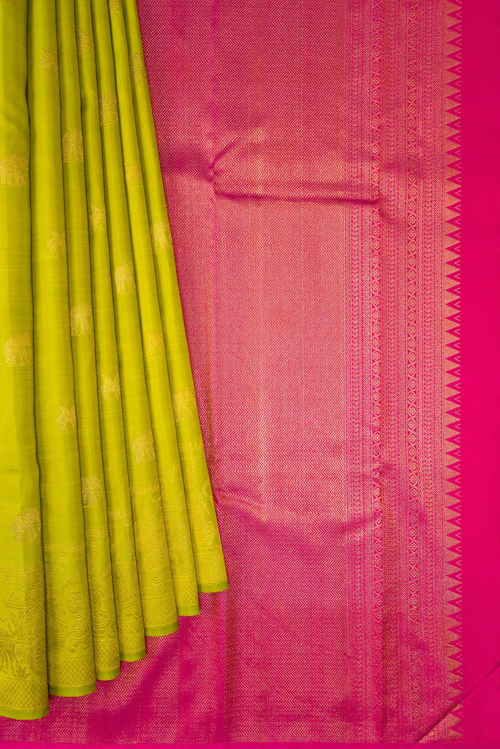 Pleats and pallu of Parrot Green Kanchipuram Silk Saree with Zari Butta on the body and Zari Border. 