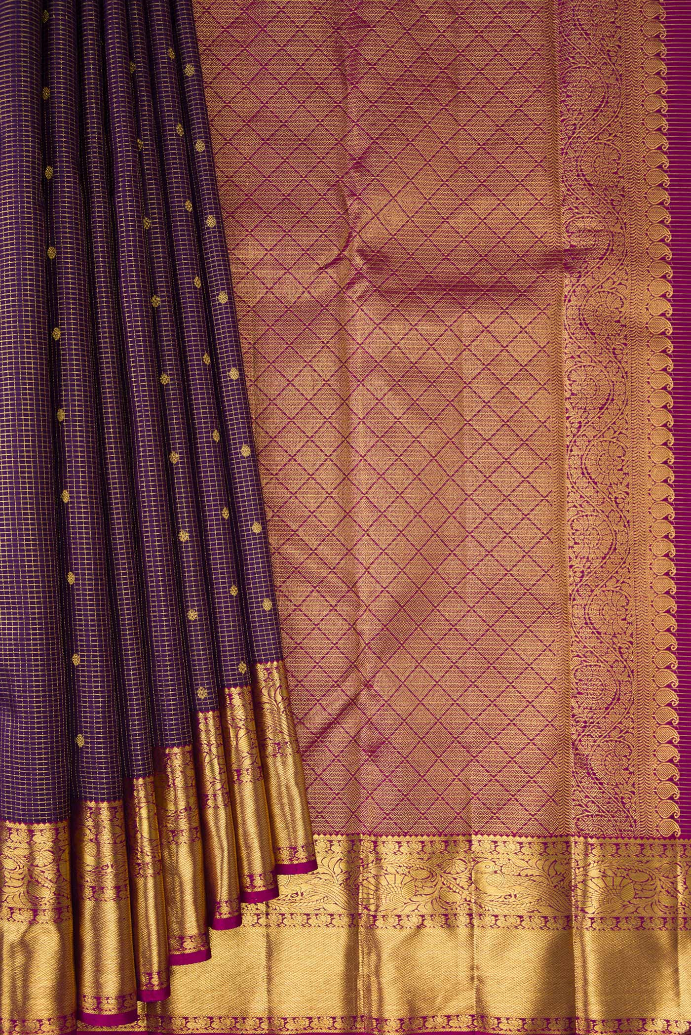 Pleats and pallu of Purple Kanjivaram Silk Saree with Checked design on the body and Zari Border. 