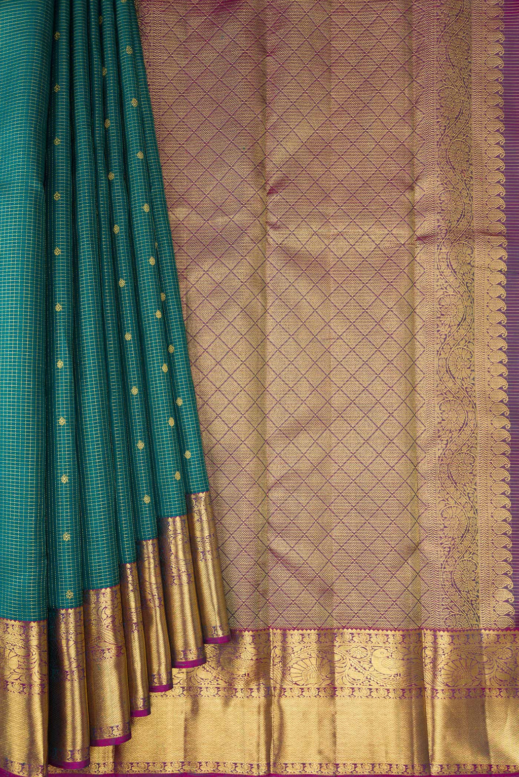 Pleats and pallu of Green Kanjivaram Silk Saree with Checked design on the body and Zari Border. 