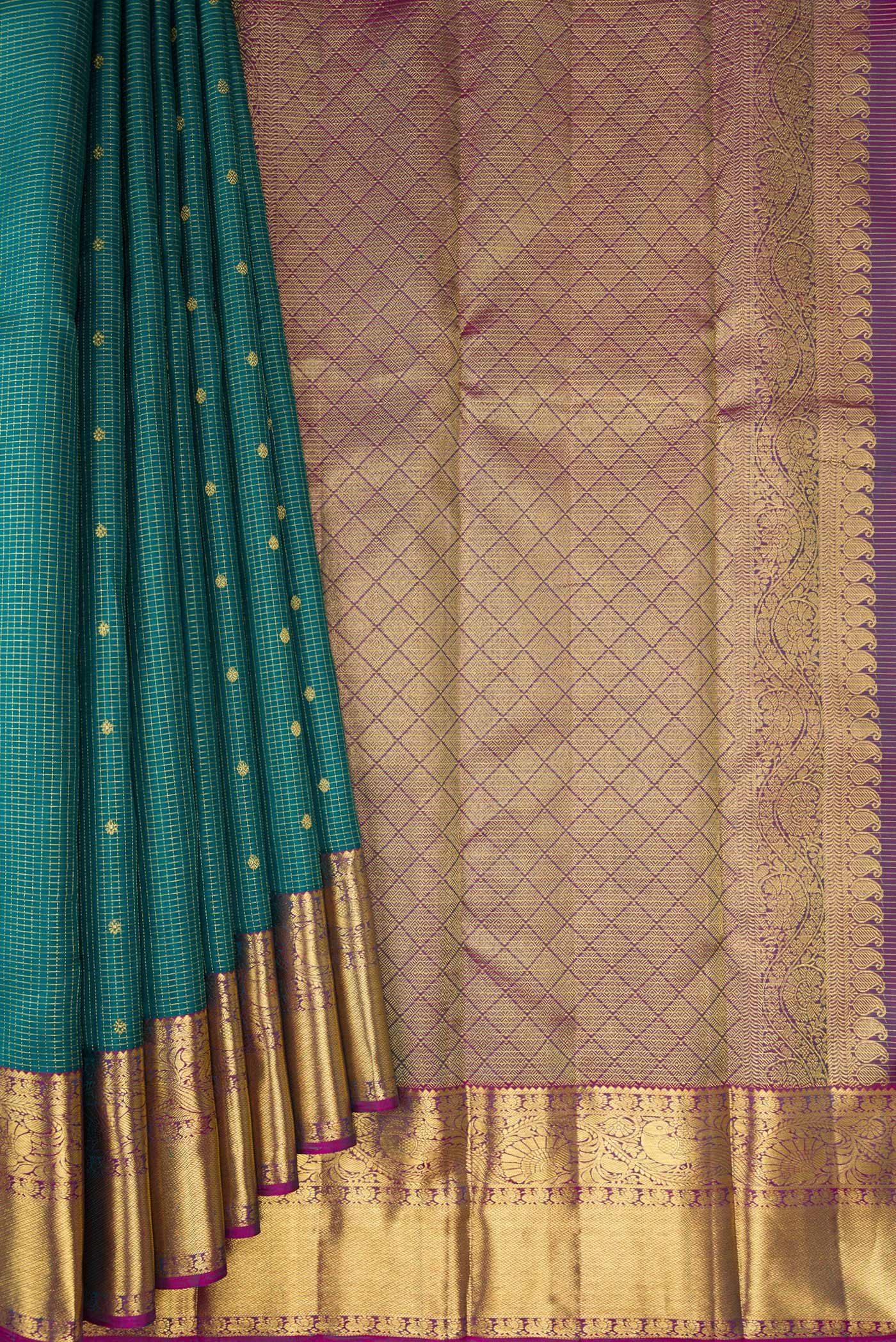 Pleats and pallu of Green Kanjivaram Silk Saree with Checked design on the body and Zari Border. 