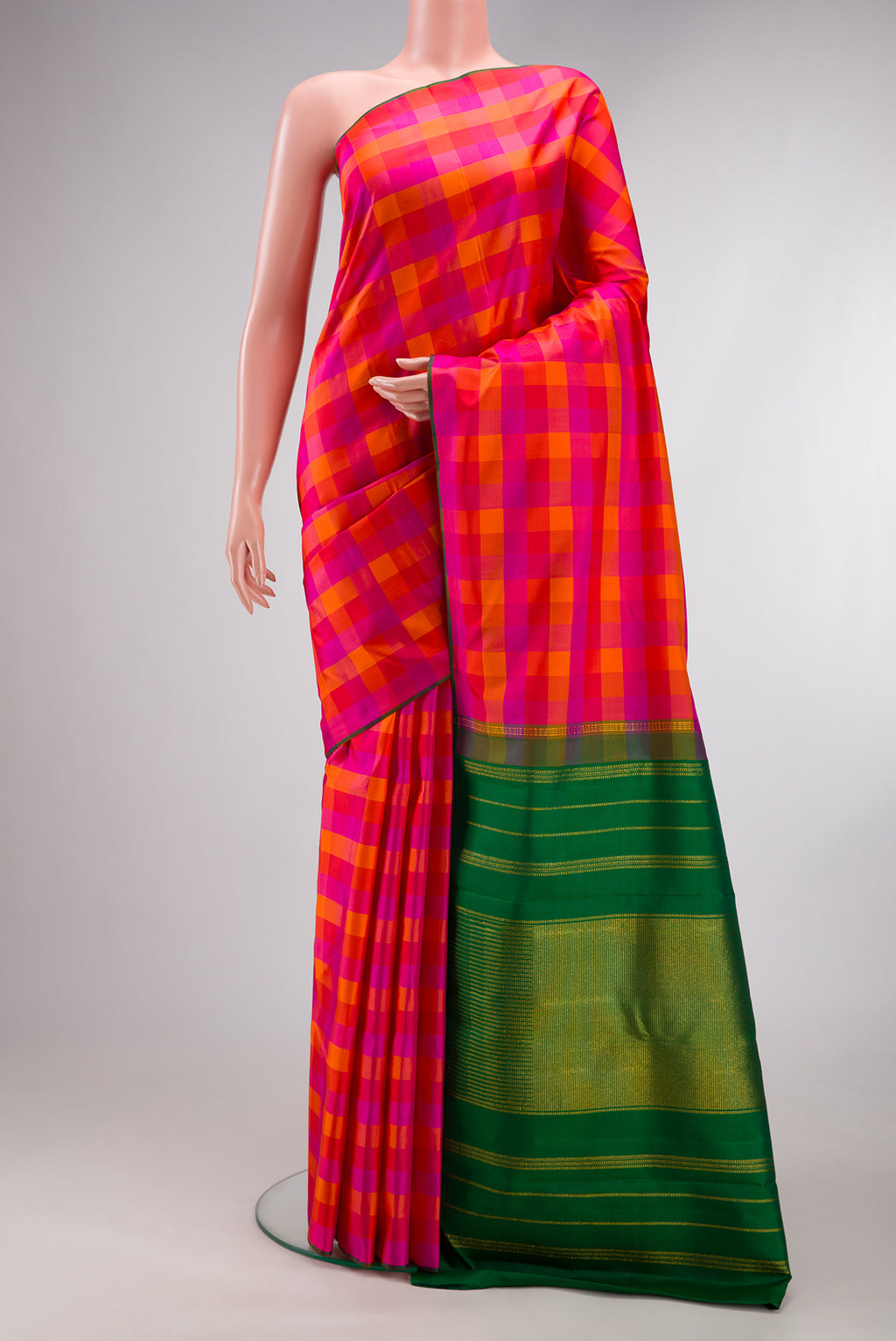 Pure Silk Multi Color Kanchipuram Saree with Checked design on the body and Without Border.  displayed on a mannequin