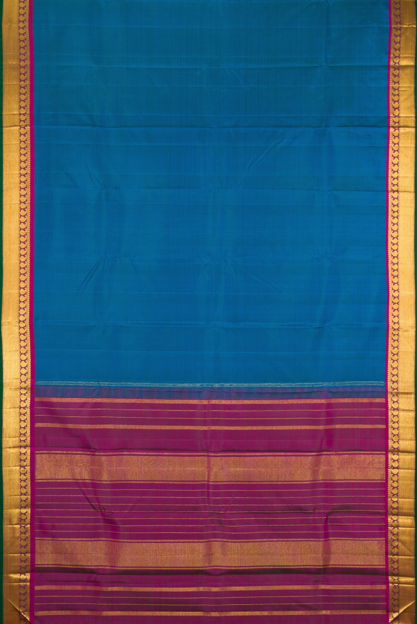 Flat view of Peacock Blue Kanchipuram Silk Saree with Plain Body and Zari Border. 