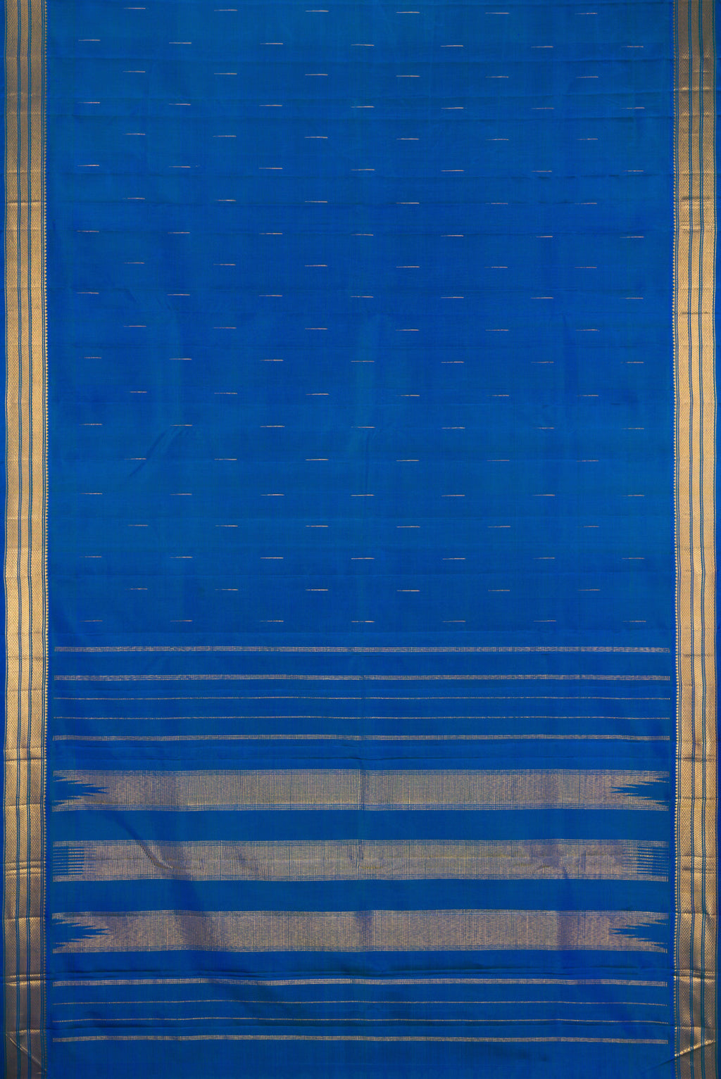 Flat view of Royal Blue Kanchipuram Silk Saree with Zari Butta on the body and Zari Border. 