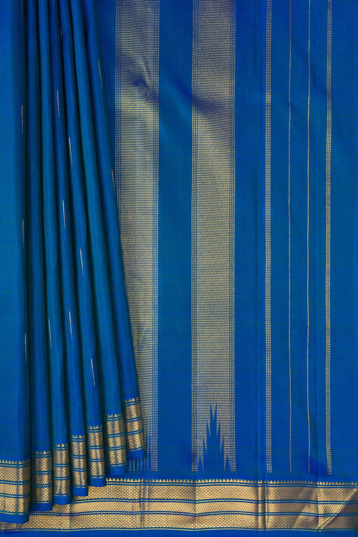 Pleats and pallu of Royal Blue Kanchipuram Silk Saree with Zari Butta on the body and Zari Border. 