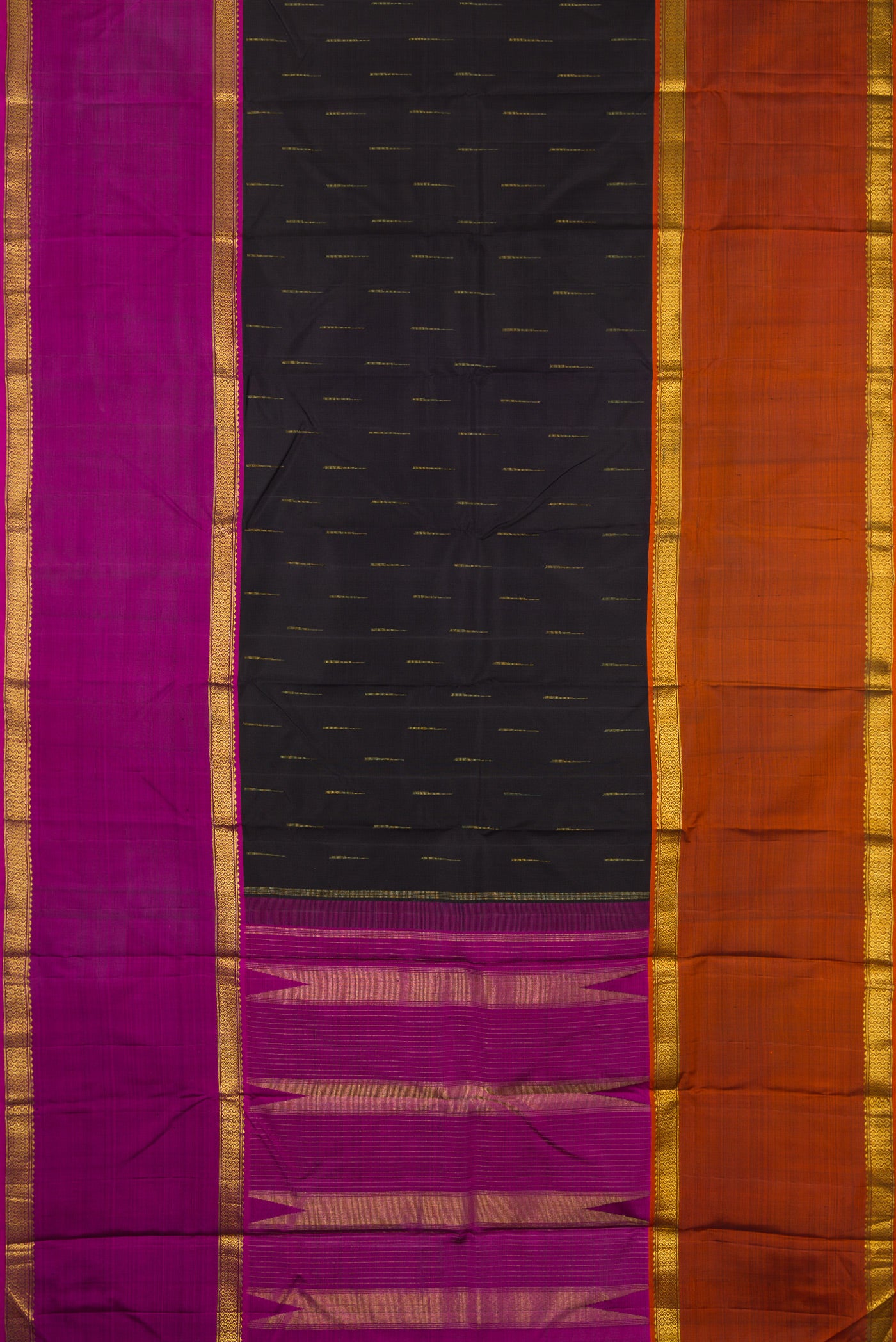 Flat view of Black Kanchipuram Silk Saree with Zari Butta on the body and Ganga Jamuna Border. 