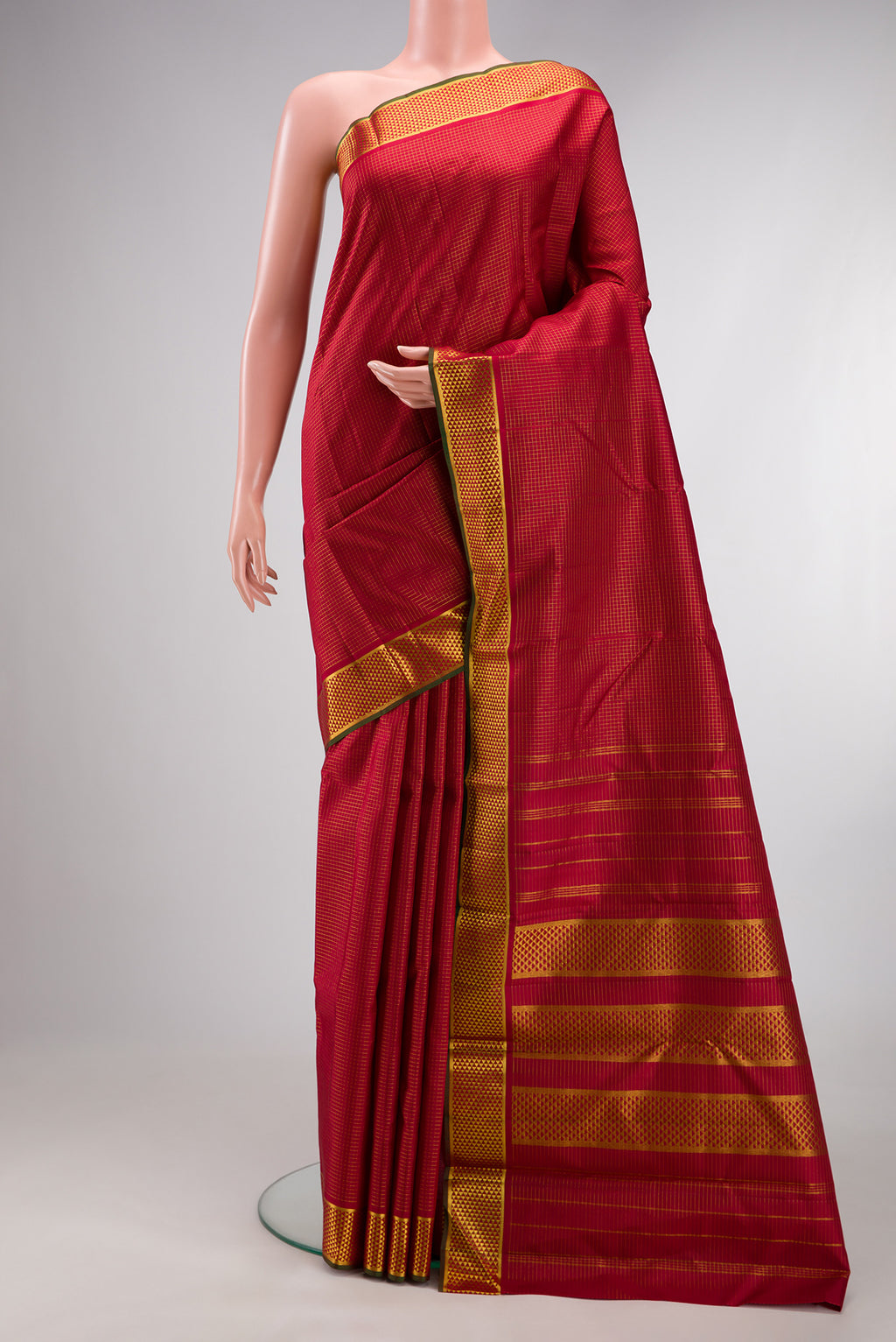 Pure Silk Maroon Kanchipuram Saree with Checked design on the body and Zari Border.  displayed on a mannequin