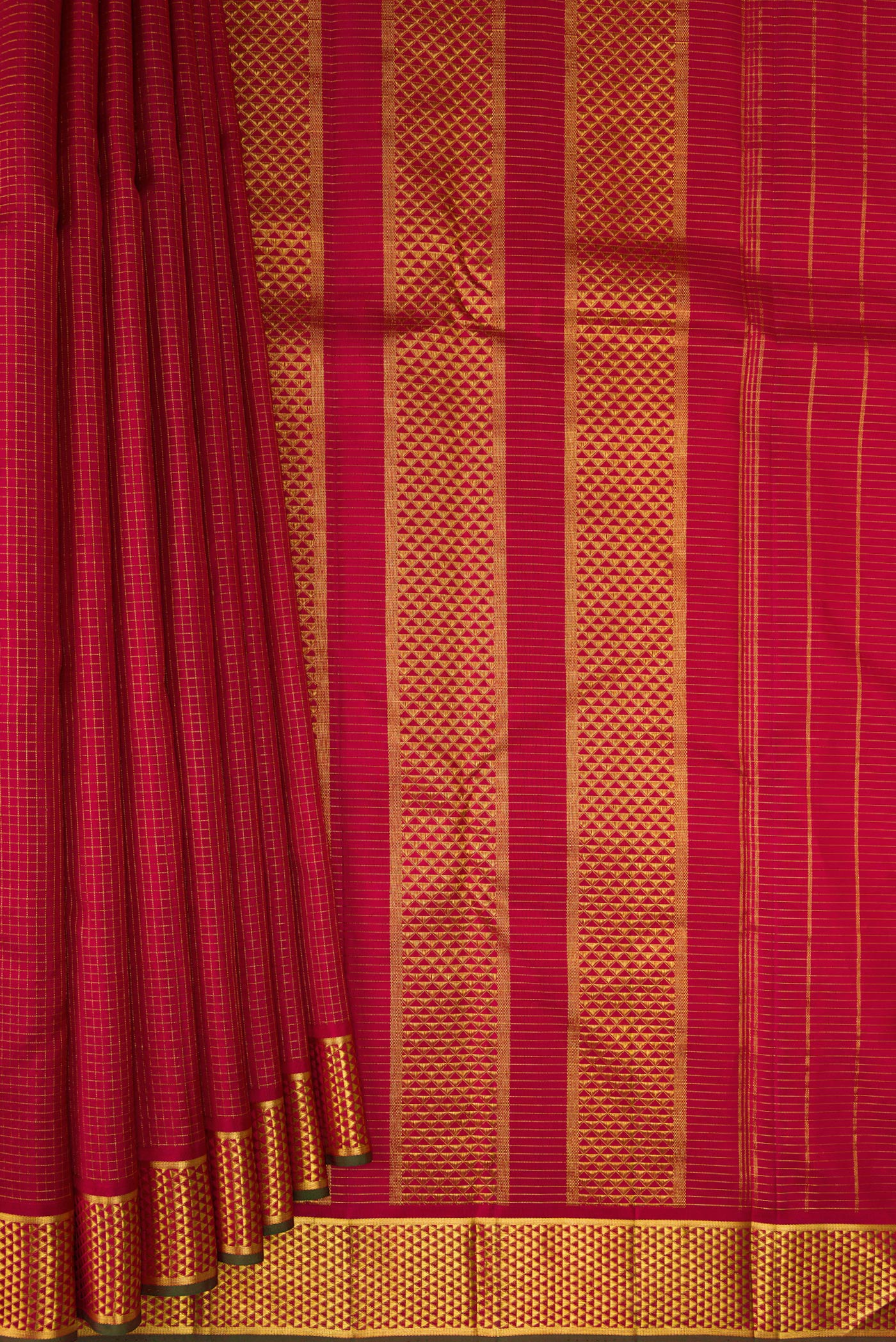 Pleats and pallu of Pure Silk Maroon Kanchipuram Saree with Checked design on the body and Zari Border. 
