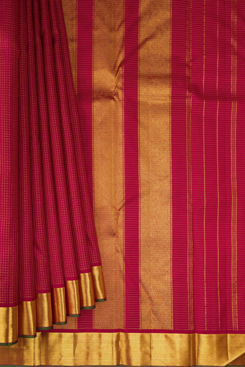 Pleats and pallu of Maroon Kanchipuram Silk Saree with Checked design on the body and Zari Border. 
