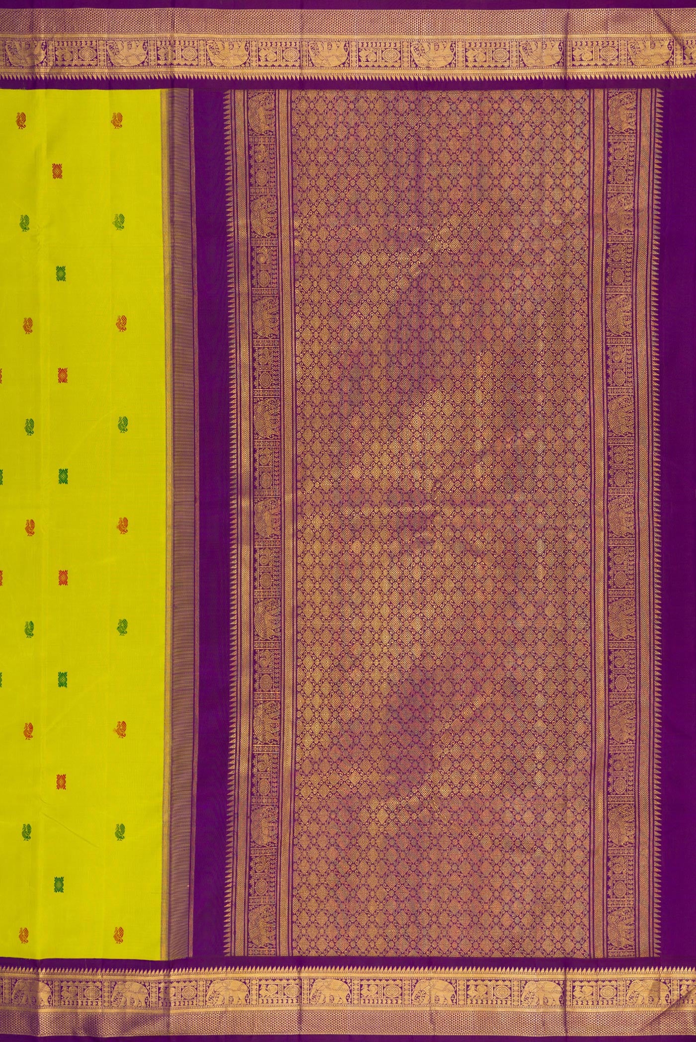 Close up image of the pallu of Parrot Green Kanjivaram Silk Saree with Thread Butta on the body and Zari Border. 