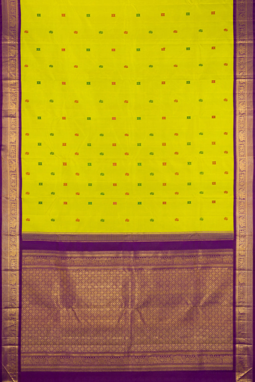 Flat view of Parrot Green Kanjivaram Silk Saree with Thread Butta on the body and Zari Border. 