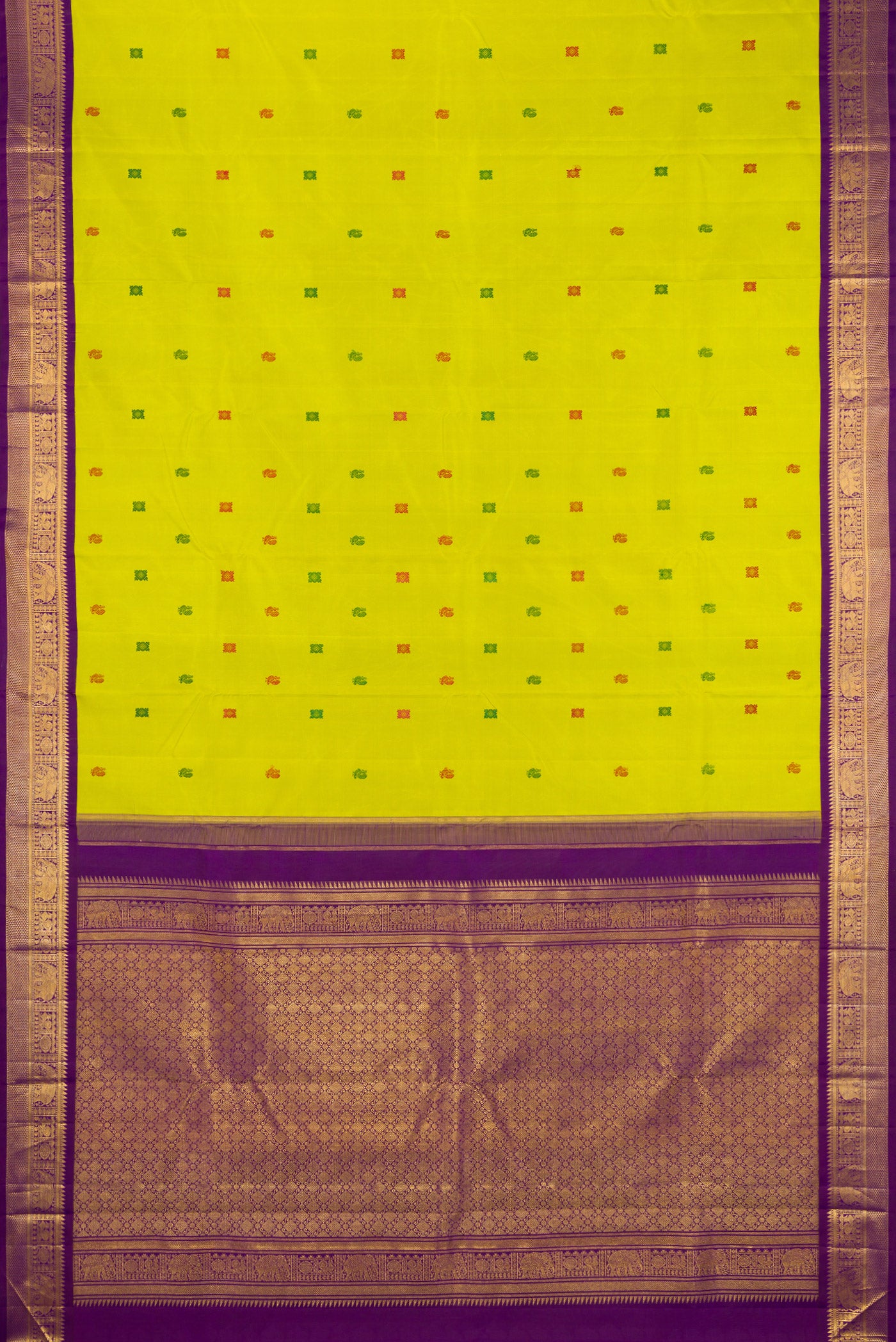 Flat view of Parrot Green Kanjivaram Silk Saree with Thread Butta on the body and Zari Border. 