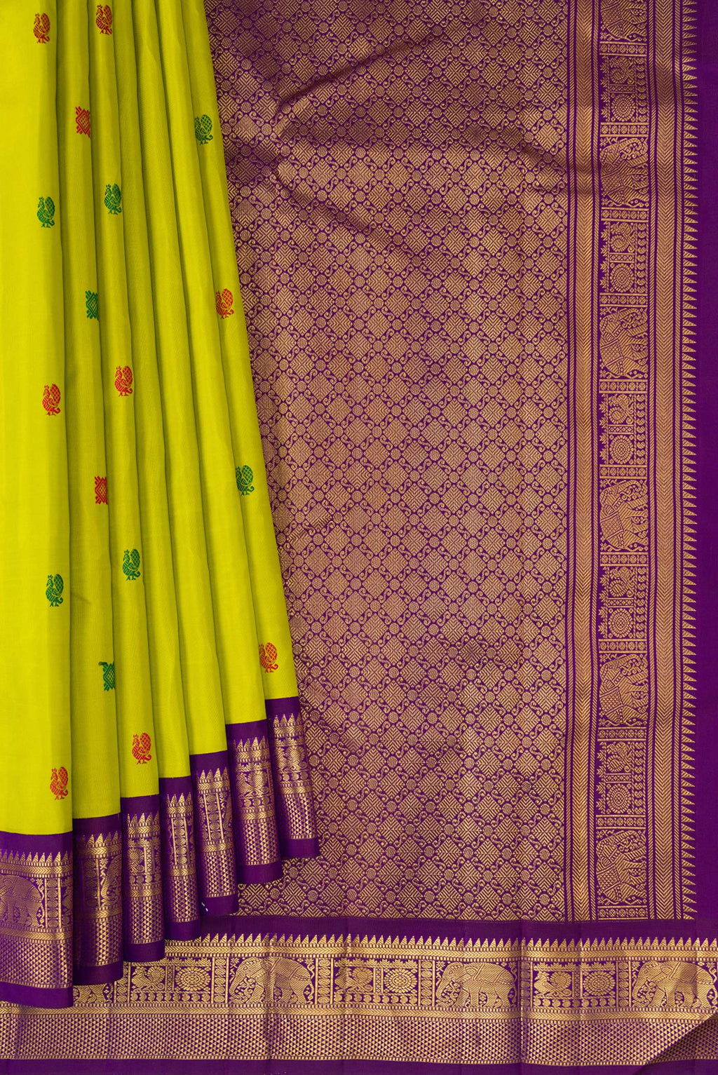 Pleats and pallu of Parrot Green Kanjivaram Silk Saree with Thread Butta on the body and Zari Border. 