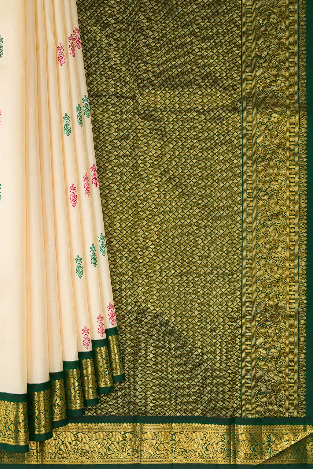 Pleats and pallu of Sandal Kanjivaram Silk Saree with Thread Butta on the body and Zari Border. 