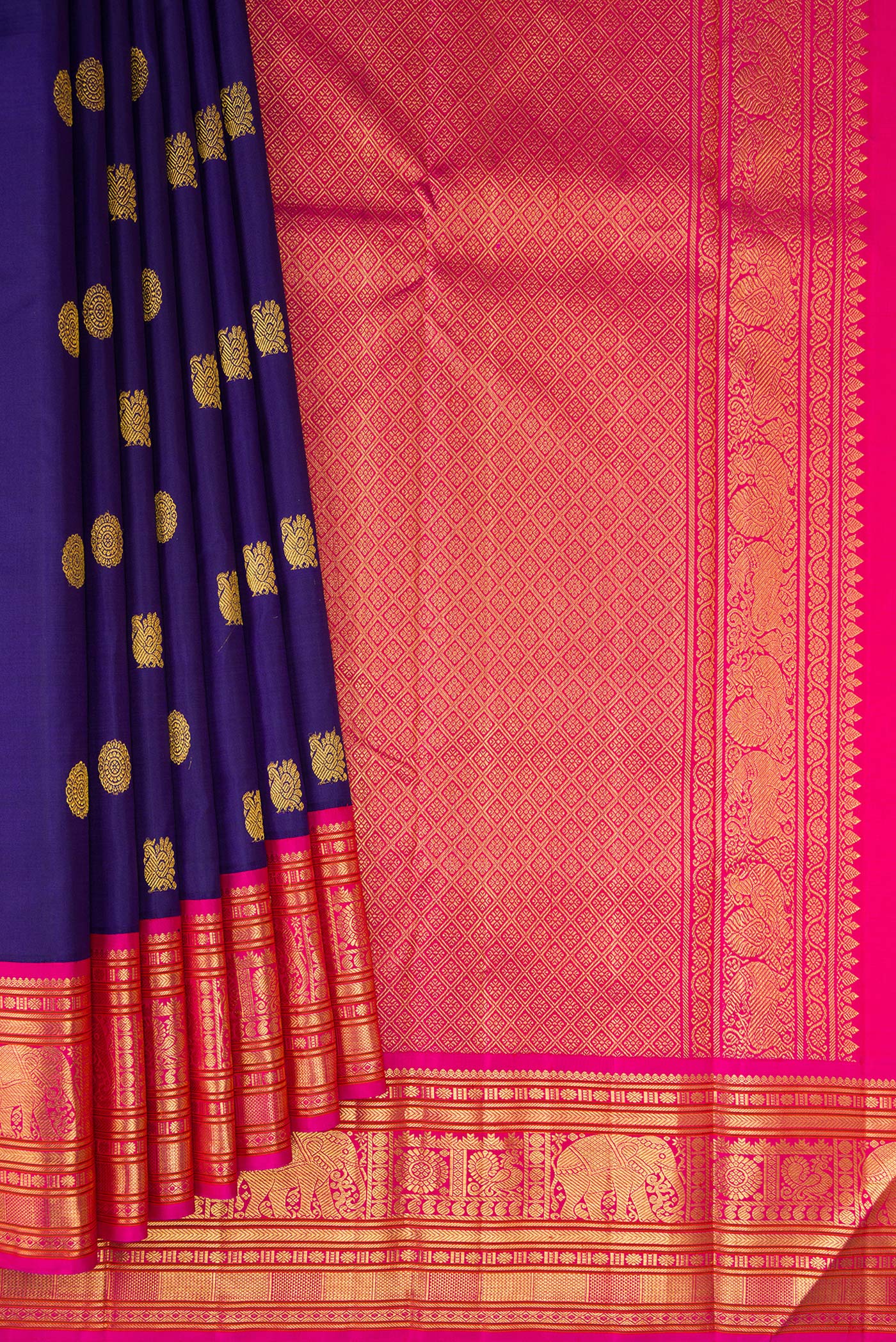 Pleats and pallu of Dark Blue Kanjivaram Silk Saree with Zari Butta on the body and Zari Border. 