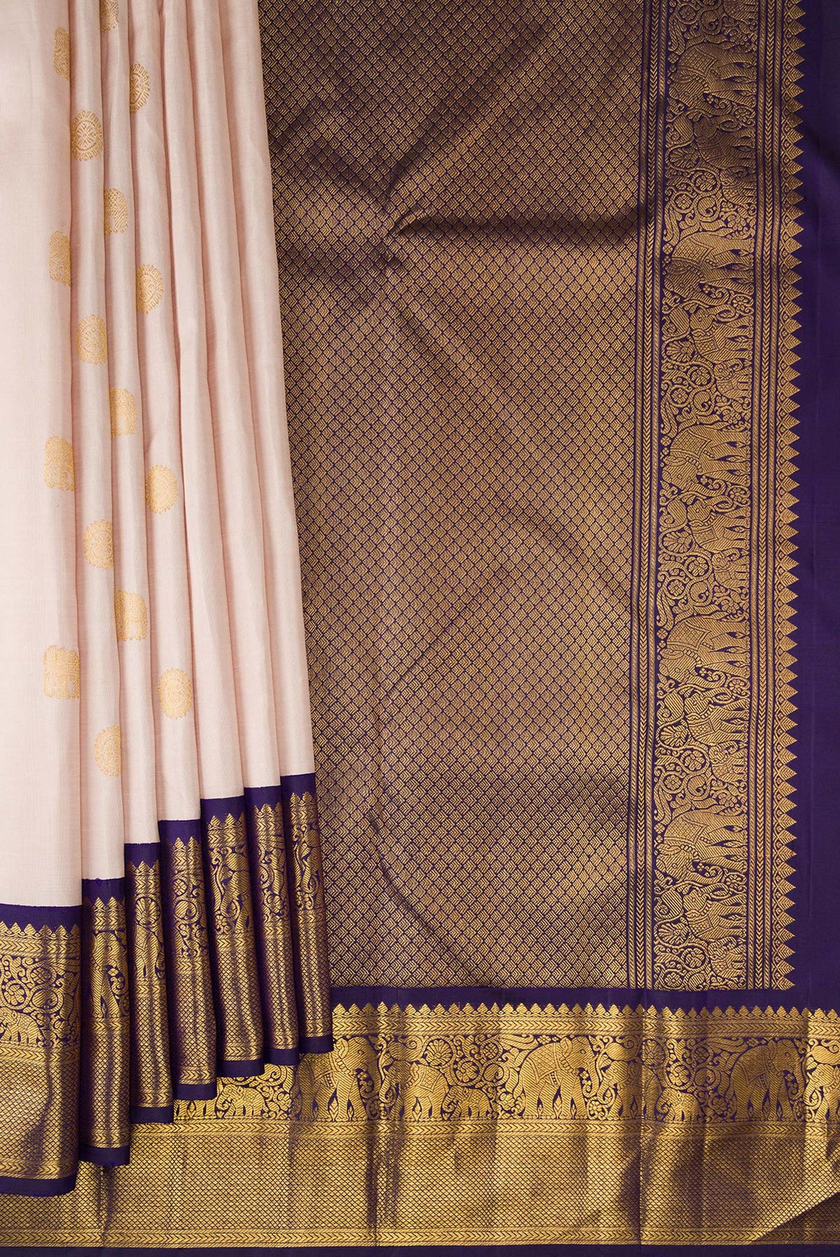 Pleats and pallu of Pure Silk Rose Gold Kanjivaram Saree with Zari Butta on the body and Zari Border. 