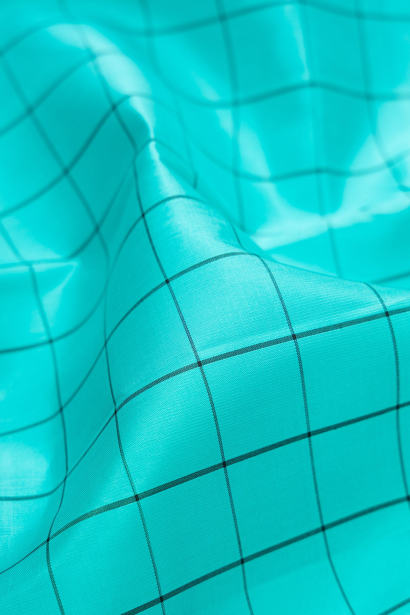 Close up of Sky Blue Kanjivaram Silk Saree with Checked design on the body and Fancy Border.  displaying folds