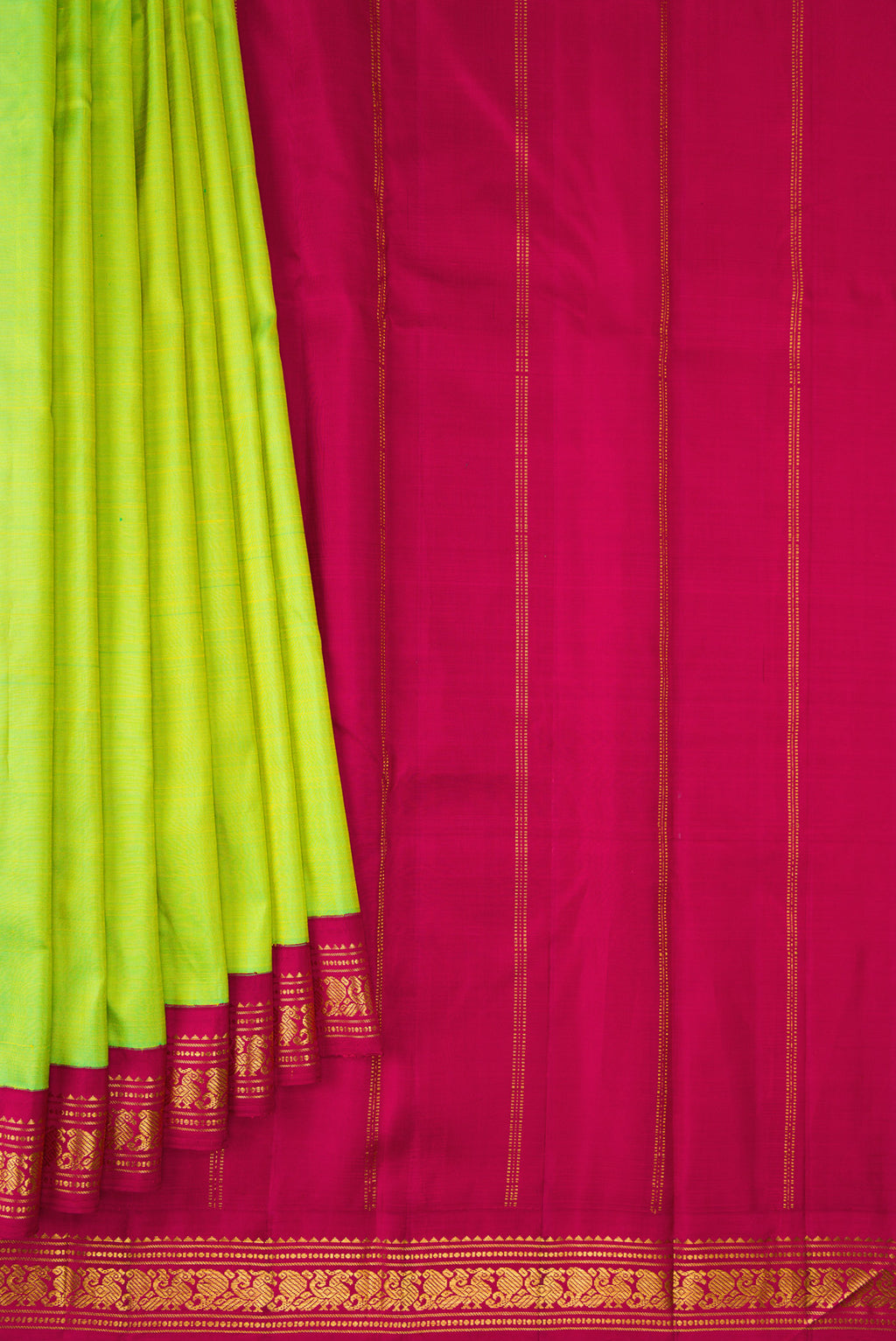 Pleats and pallu of Pure Silk Pure Zari Parrot Green Kanjivaram Saree with Plain Body and One Side Border. 