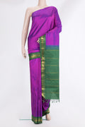 Pure Silk Pure Zari Purple Dual Tone Kanjivaram Saree with Plain Body and One Side Border.  displayed on a mannequin