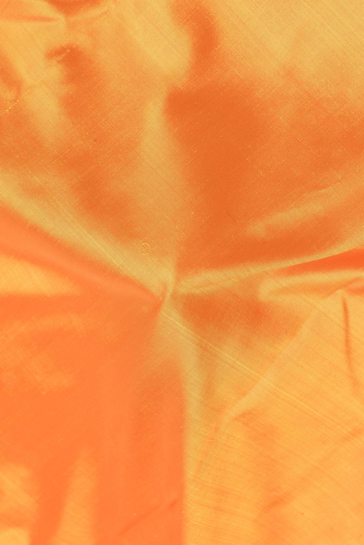 Close up of Pure Silk Pure Zari Yellow Dual Tone Kanjivaram Saree with Plain Body and One Side Border.  displaying folds