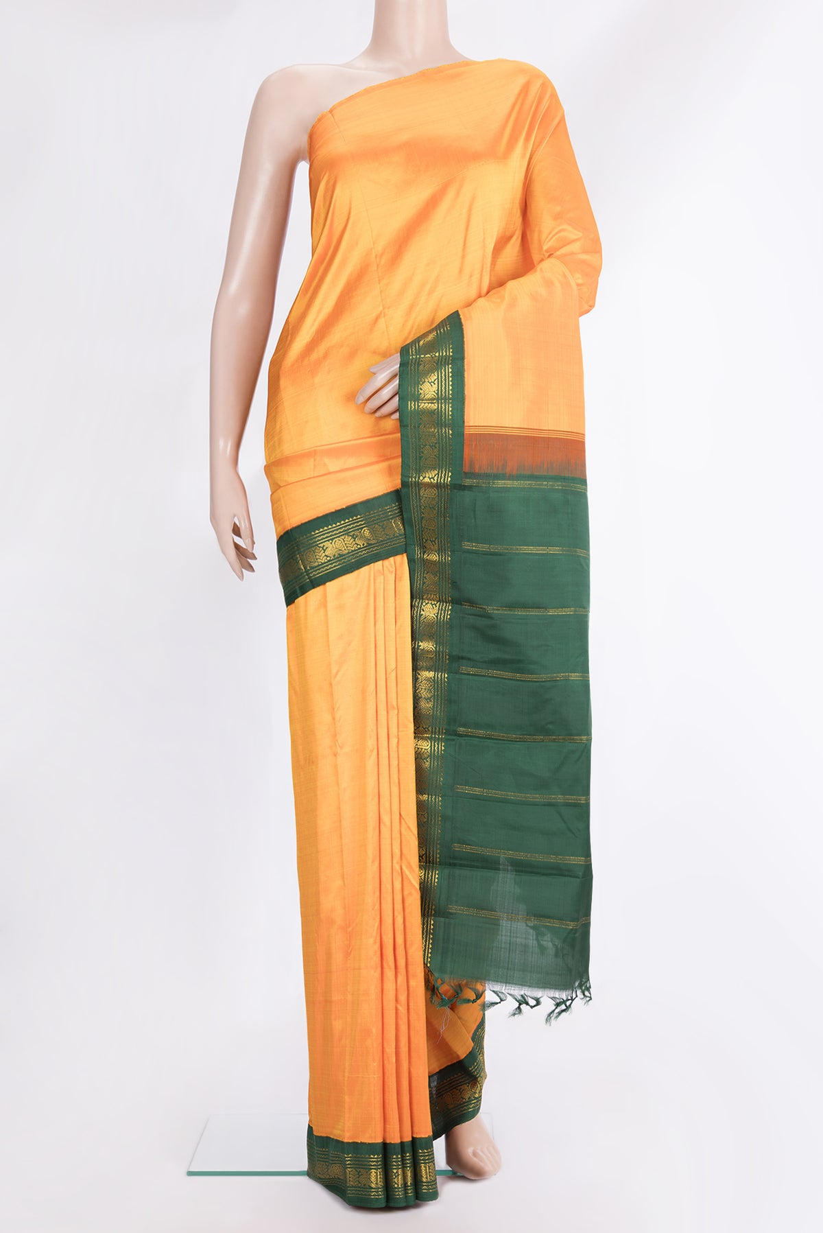 Pure Silk Pure Zari Yellow Dual Tone Kanjivaram Saree with Plain Body and One Side Border.  displayed on a mannequin