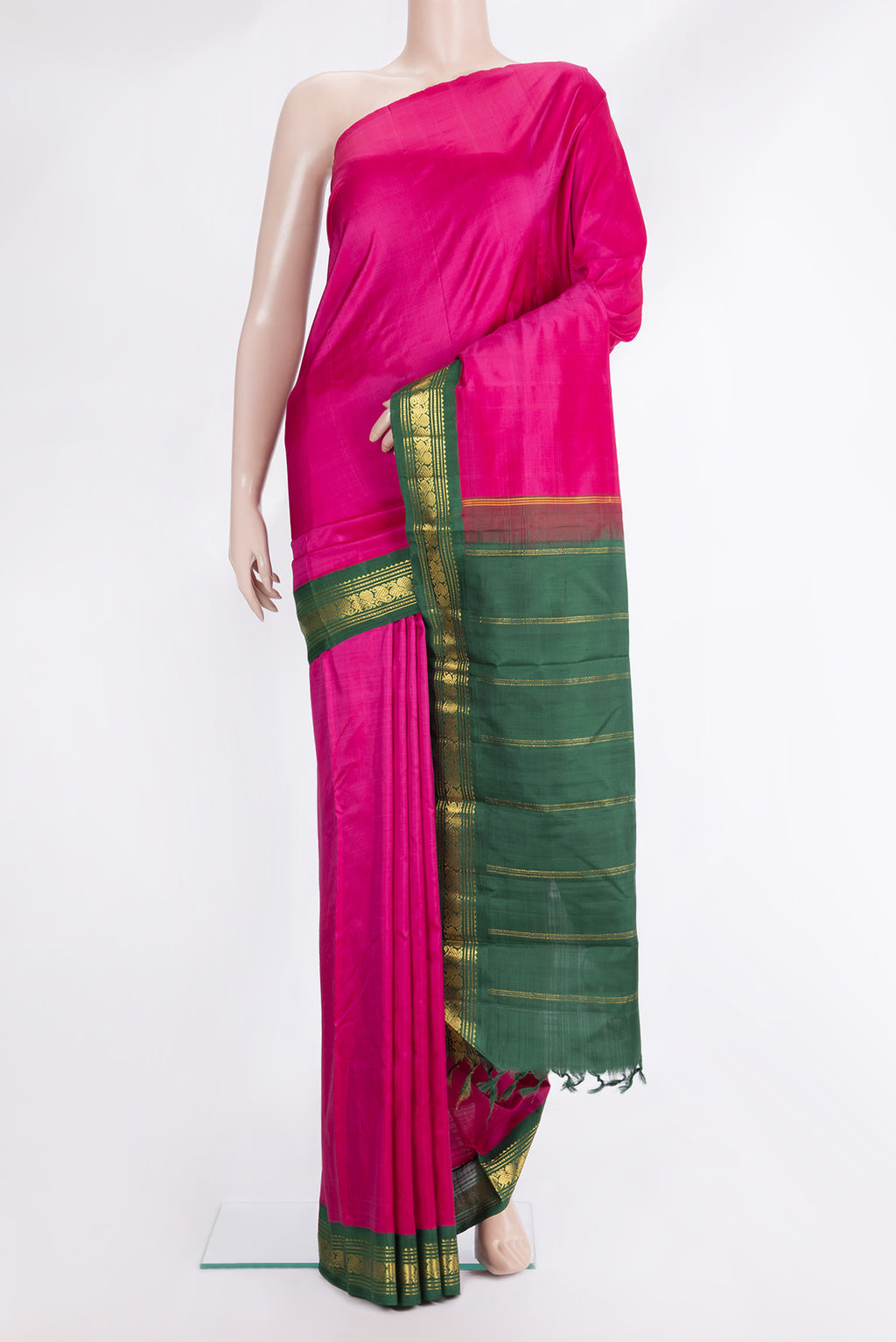 Pure Silk Pure Zari Dark Pink Kanjivaram Saree with Plain Body and One Side Border.  displayed on a mannequin