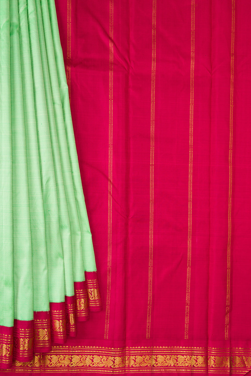 Pleats and pallu of Pure Silk Pure Zari Pista Green Kanjivaram Saree with Plain Body and One Side Border. 