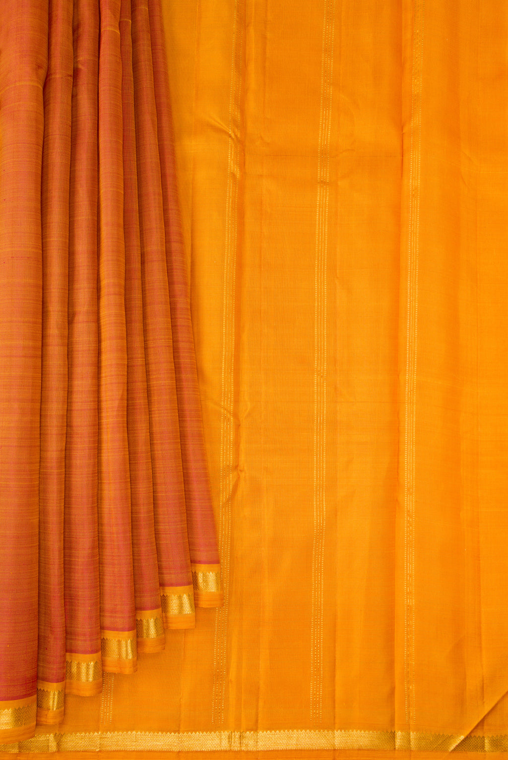 Pleats and pallu of Pinkish Yellow Dual Tone Kanjivaram Silk Saree with Plain Body and Zari Border. 