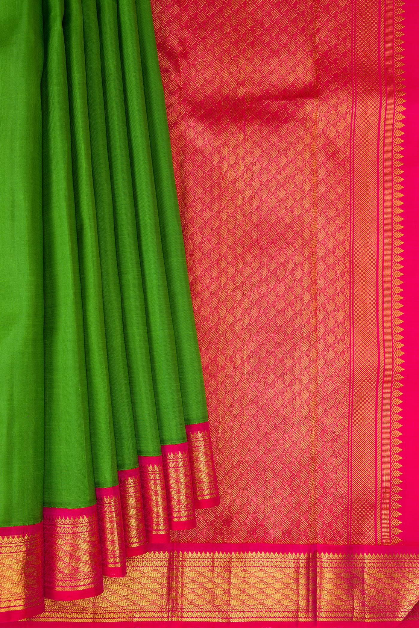 Pleats and pallu of Green Kanjivaram Silk Saree with Plain Body and Zari Border. 