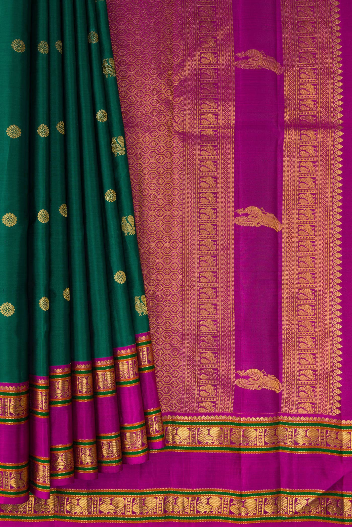Pleats and pallu of Teal Kanchipuram Silk Saree with Zari Butta on the body and Zari Border. 