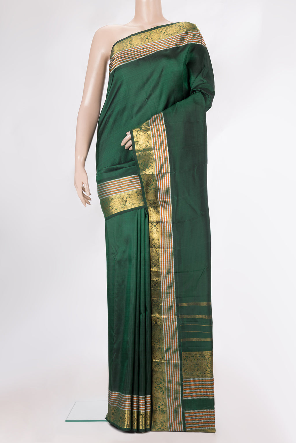 Pure Silk Bottle Green Kanchipuram Saree with Plain Body and Zari Border.  displayed on a mannequin