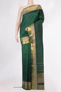 Pure Silk Bottle Green Kanchipuram Saree with Plain Body and Zari Border.  displayed on a mannequin