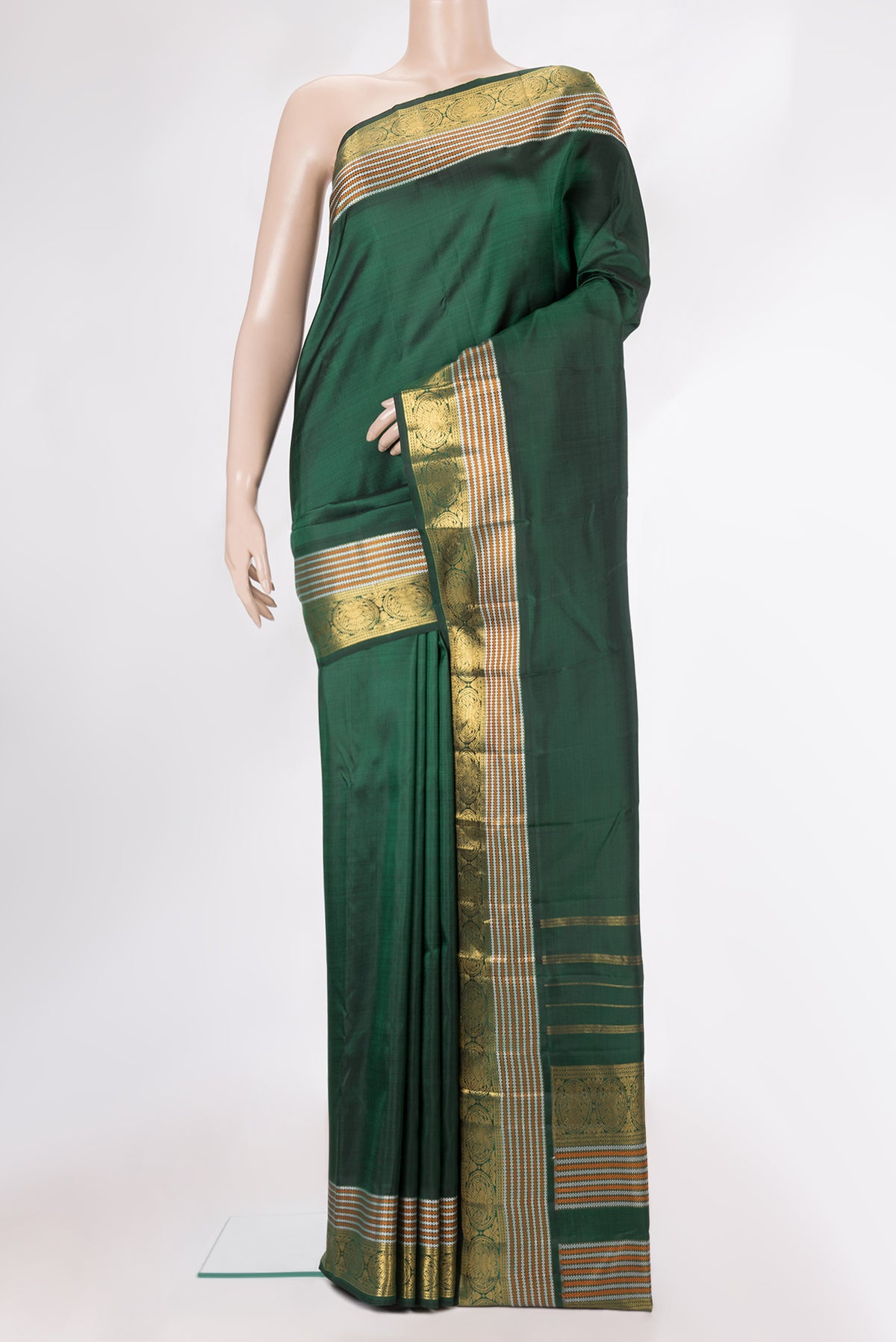 Pure Silk Bottle Green Kanchipuram Saree with Plain Body and Zari Border.  displayed on a mannequin