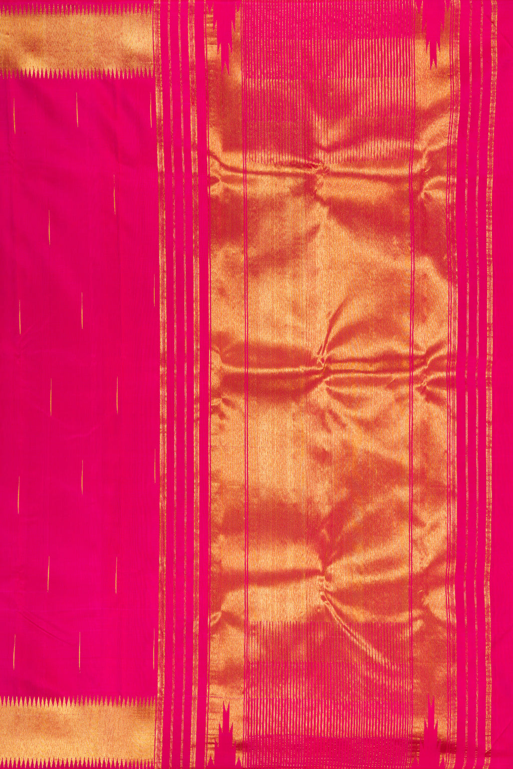 Close up image of the pallu of Dark Pink Kanjivaram Silk Saree with Zari Butta on the body and Zari Border. 