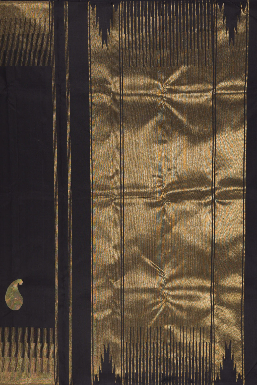 Close up image of the pallu of Black Kanchipuram Silk Saree with Plain Body and Zari Border. 