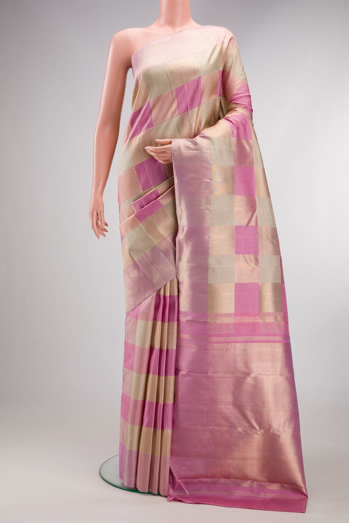 Pure Silk Multi Color Kanchipuram Saree with Checked design on the body and Zari Border.  displayed on a mannequin