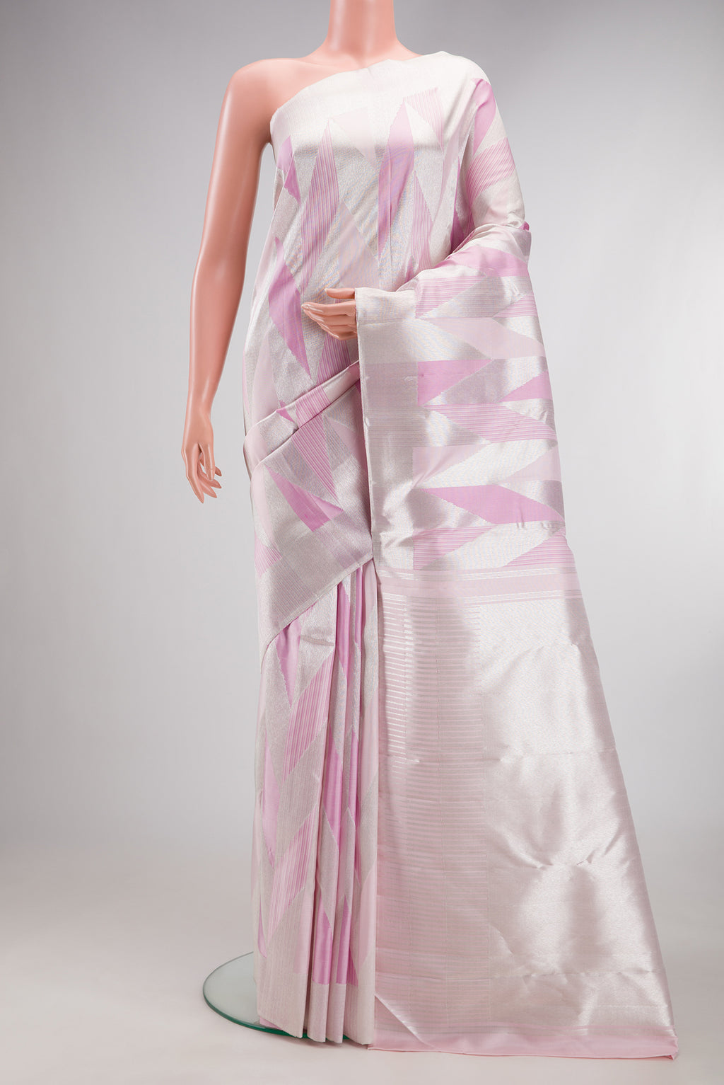 Pure Silk Rose pink Kanchipuram Saree with Zari Brocade on the body and Zari Border.  displayed on a mannequin