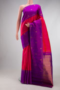 Pink Dual Tone Kanchipuram Silk Saree with Plain Body and Zari Border.  displayed on a mannequin