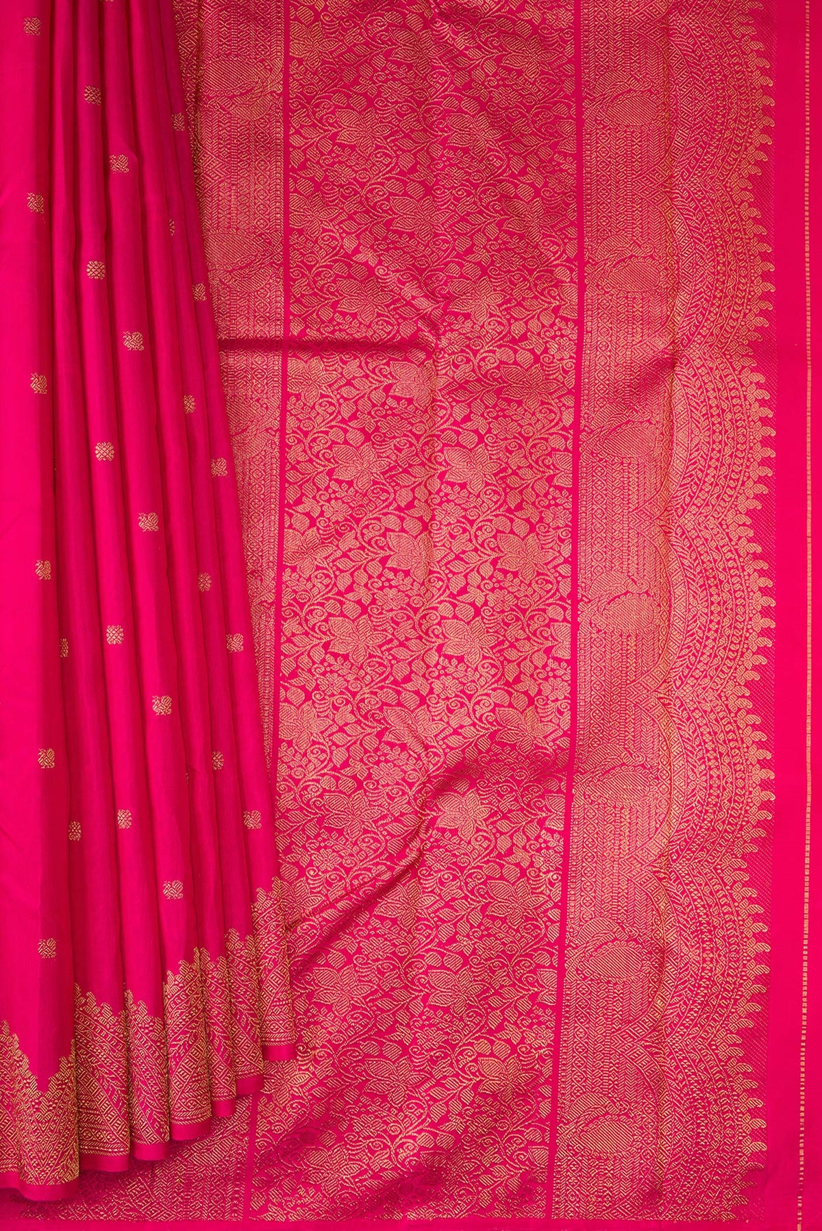 Pleats and pallu of Pure Silk Pure Zari Pink Kanjivaram Saree with Zari Butta on the body and Fancy Border. 
